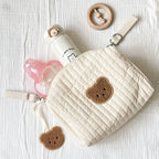 Trousse à langer matelassée brodée - Pochette nomade à clipser sur la poussette