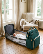 Sac à dos à langer nomade Tendrinette · Vert · bébé dans le berceau [c:vert]