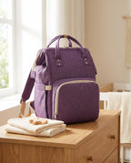 Sac à dos à langer nomade Tendrinette · Violet · scène nursery [c:violet]