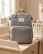 Sac à dos à langer nomade Tendrinette · Gris · scène nursery