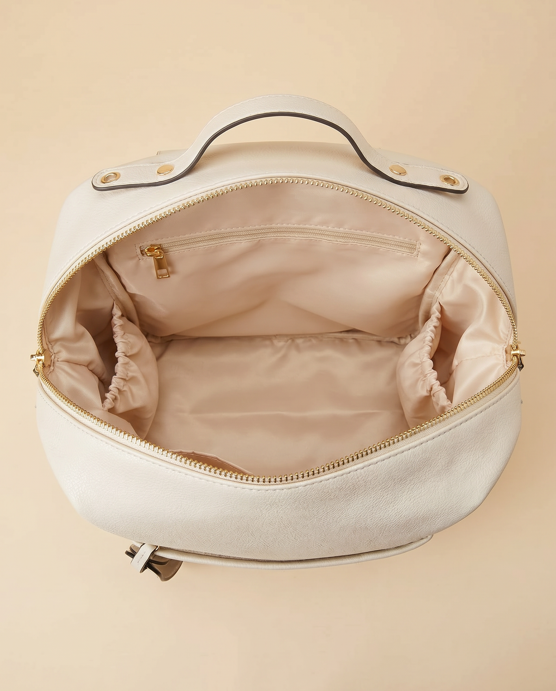 Sac à dos à langer façon cuir Tendrinette · Ivoire · intérieur vue de dessus