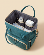 Sac à dos à langer bébé maternité matelassé Tendrinette · Bleu canard · intérieur ouvert et poches élastiquées