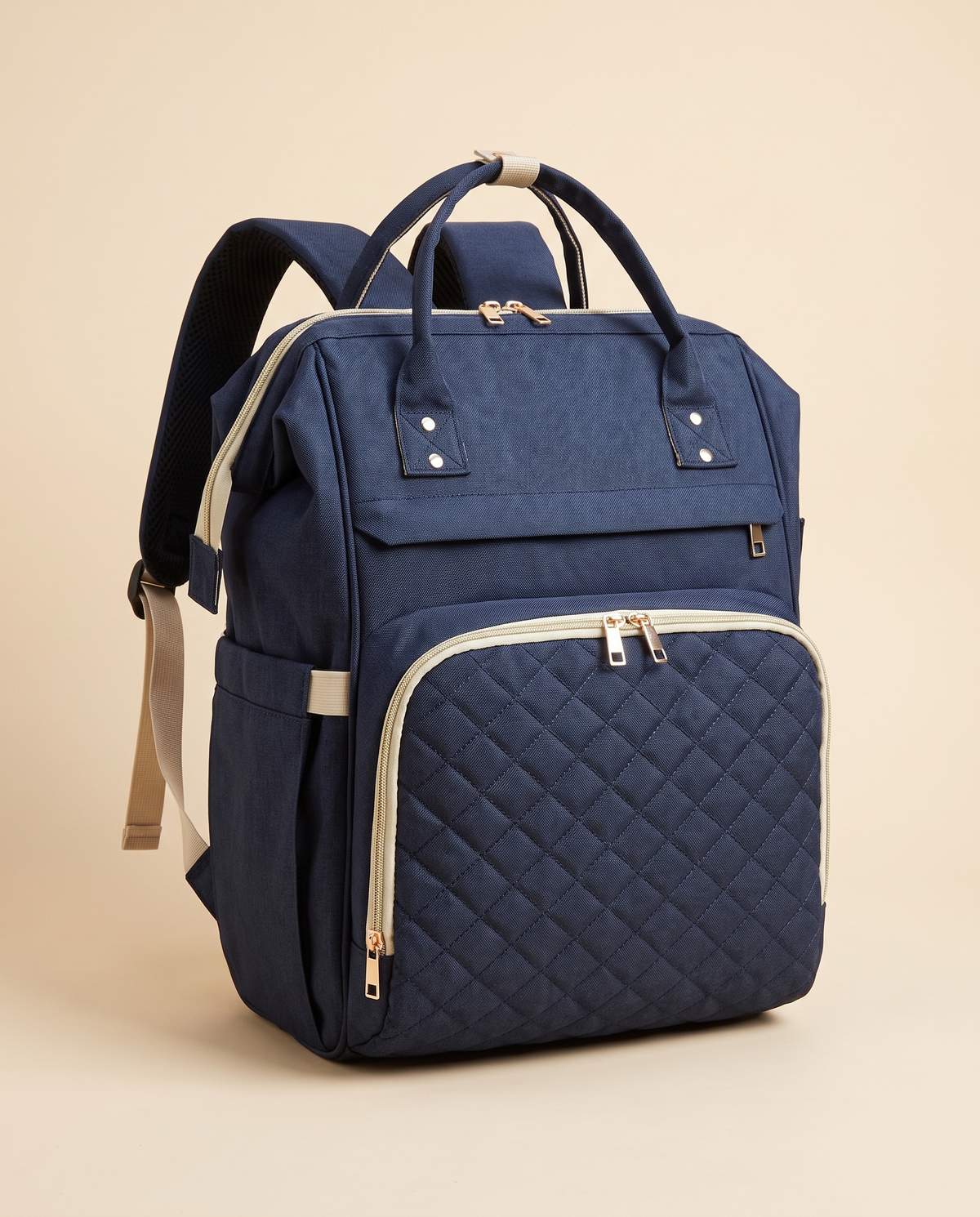 Sac à dos à langer bébé maternité matelassé Tendrinette · Bleu marine · packshot studio trois quarts