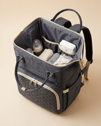 Sac à dos à langer bébé maternité matelassé Tendrinette · Gris anthracite · intérieur ouvert et poches élastiquées