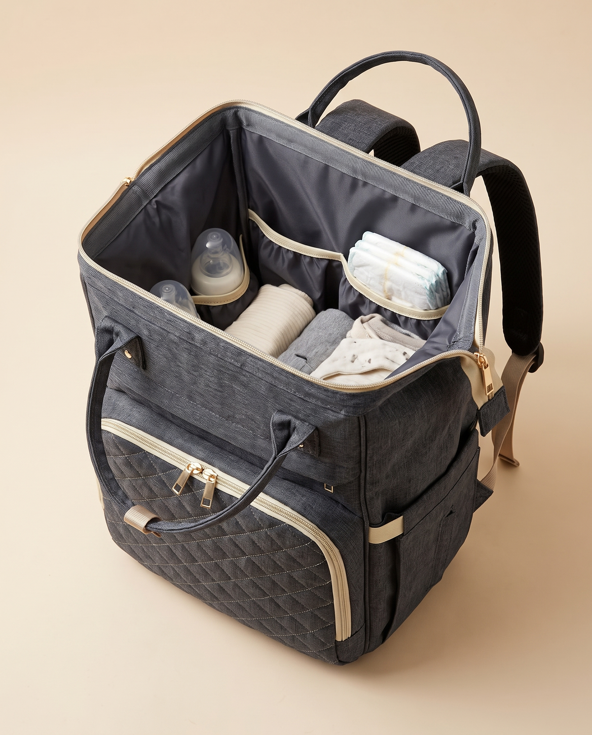 Sac à dos à langer bébé maternité matelassé Tendrinette · Gris anthracite · intérieur ouvert et poches élastiquées