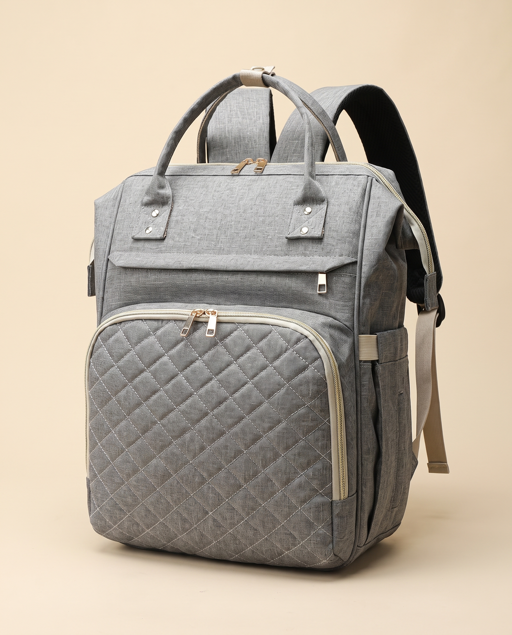 Sac à dos à langer bébé maternité matelassé Tendrinette · Gris clair · packshot studio trois quarts