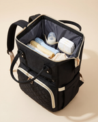 Sac à dos à langer bébé maternité matelassé Tendrinette · Noir · intérieur ouvert et poches élastiquées