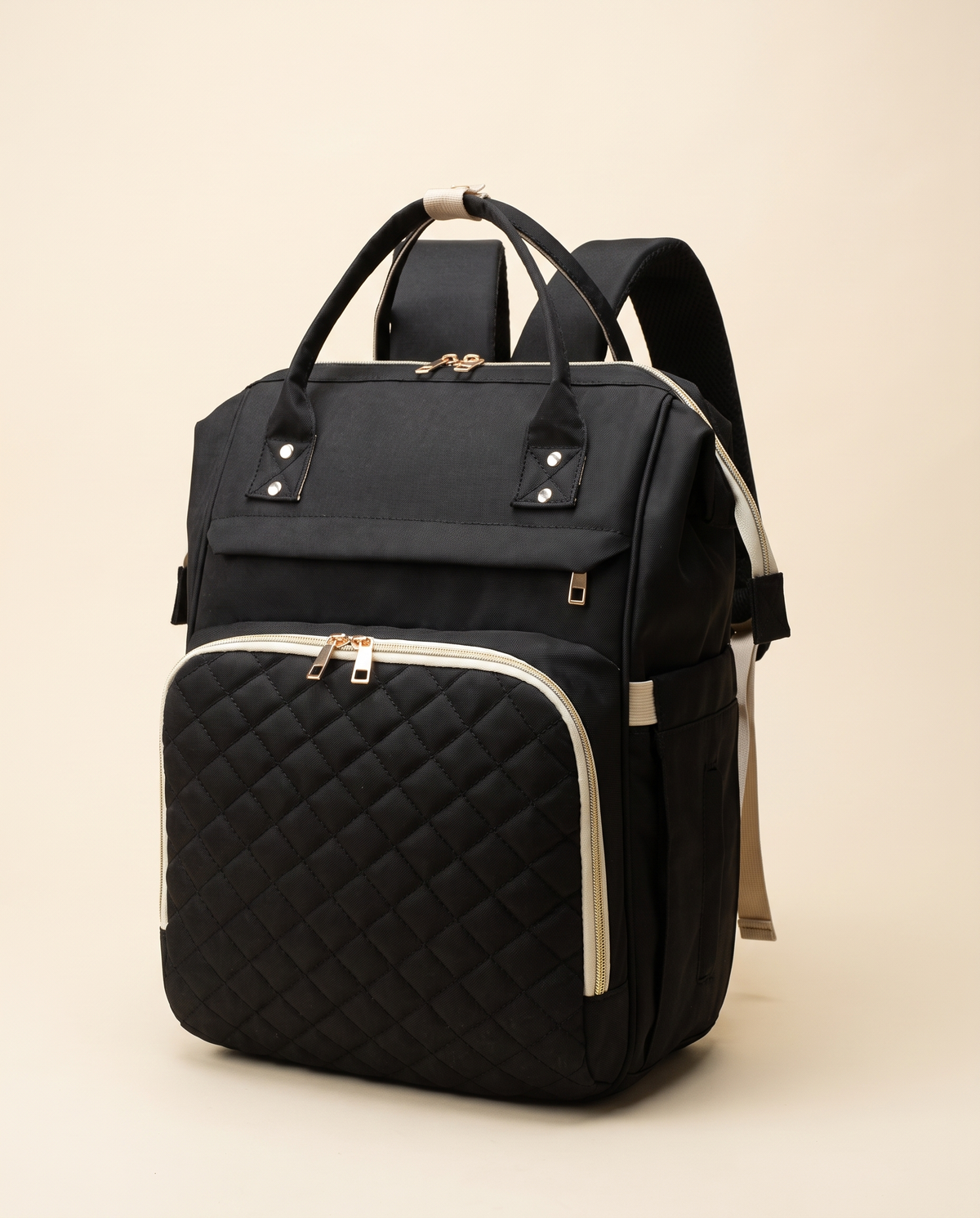 Sac à dos à langer bébé maternité matelassé Tendrinette · Noir · packshot studio trois quarts