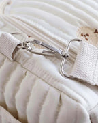 Sac à langer maternité matelassé brodé Tendrinette · mousqueton de la bandoulière et anneau D