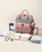 Sac à langer 2-en-1 Tendrinette · Gris rosé · tout ce qu'il peut contenir