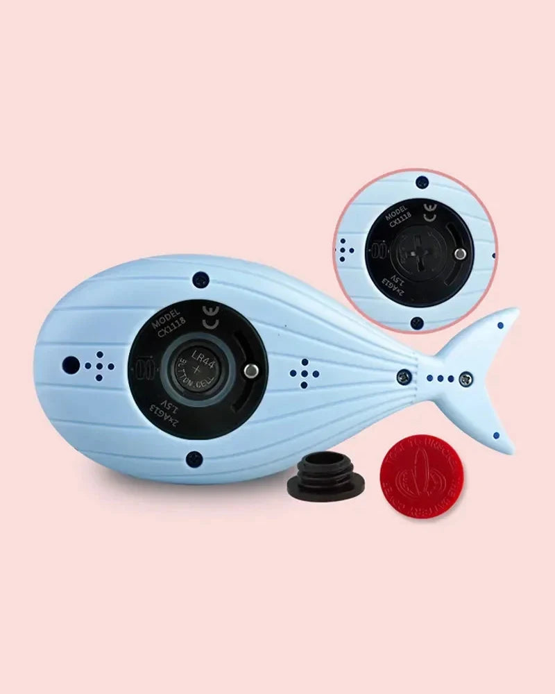 Thermomètre de bain bébé flottant Tendrinette · dos : capot étanche des 2 piles LR44 et clé d'ouverture